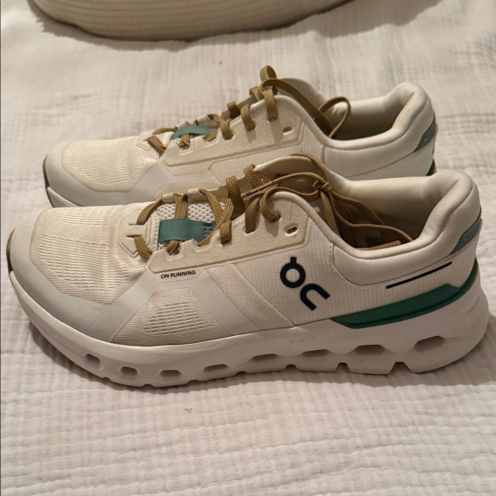 On Running Cream and Tan Athletic Shoes
